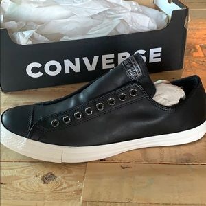BRAND NEW. Converse Black Leather Slip On.
